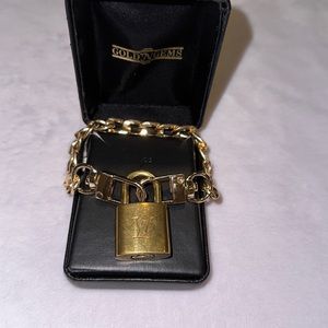 *SOLD*- 303 Authentic Louis Vuitton lock with approx. 7” 14k gold overlay chain
